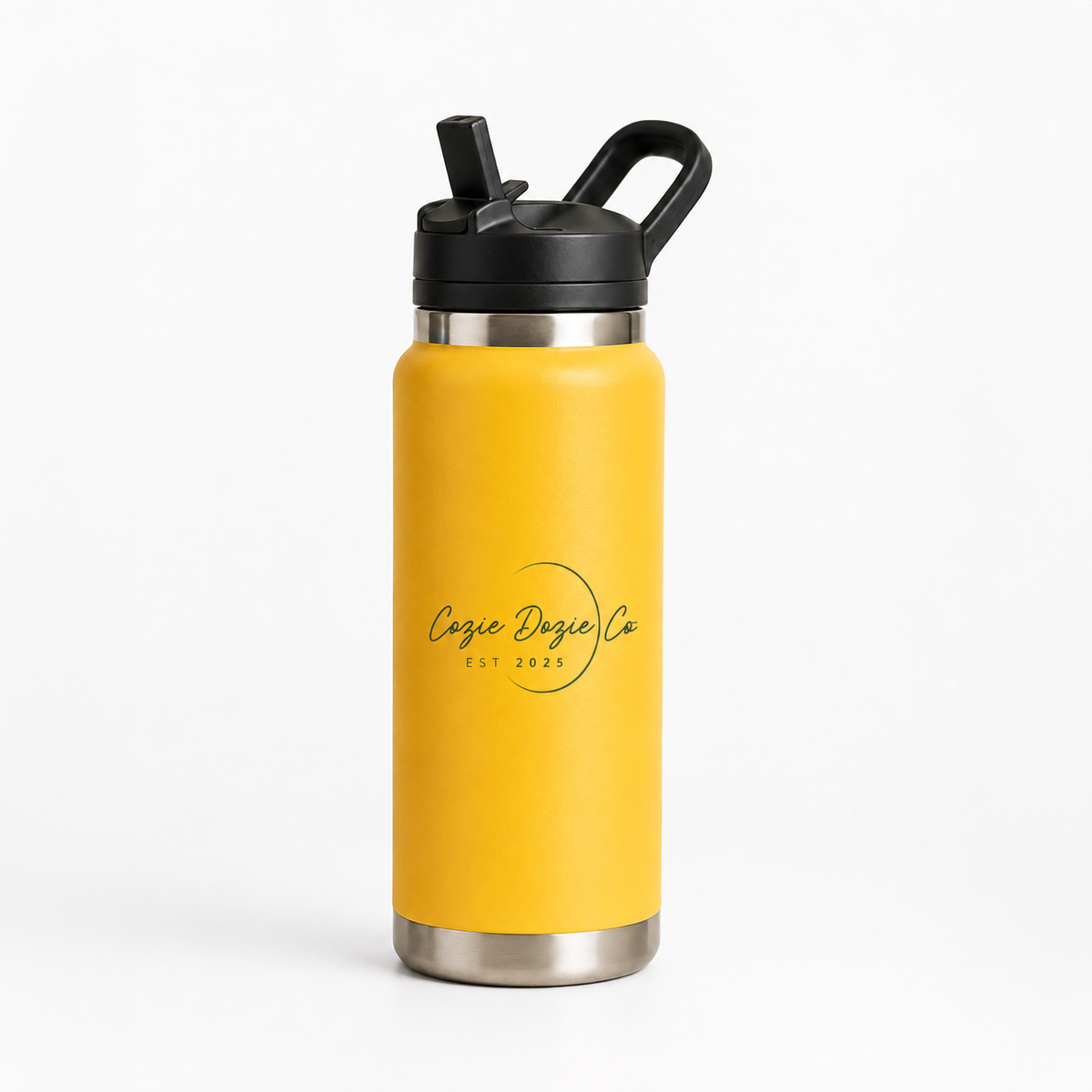 Cozie Dozie Co. 27oz insulated stainless steel kids drink bottle in Ochre yellow with custom logo and black flip sippy lid.